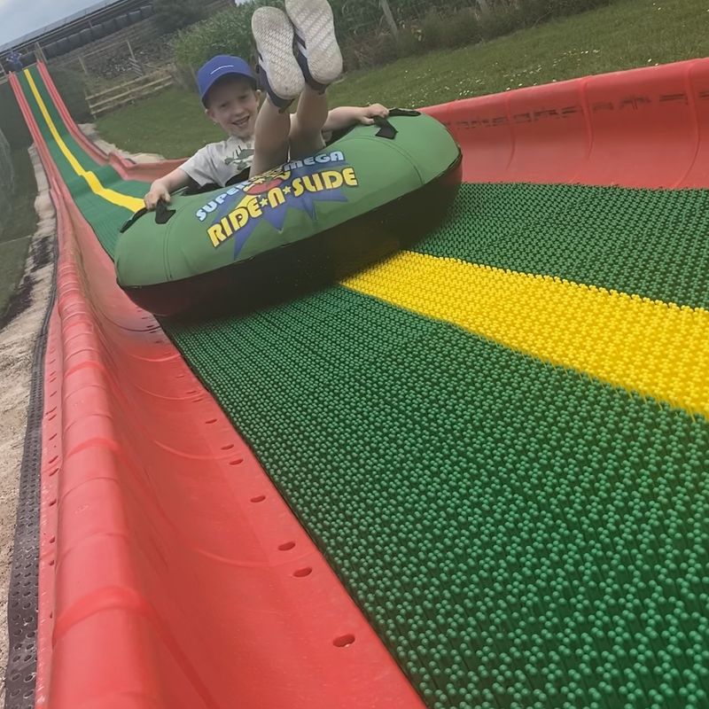 150-foot-long Super Mega Ride n Slide at the Lakeland Maze Farm Park near Kendal, the Lake District.