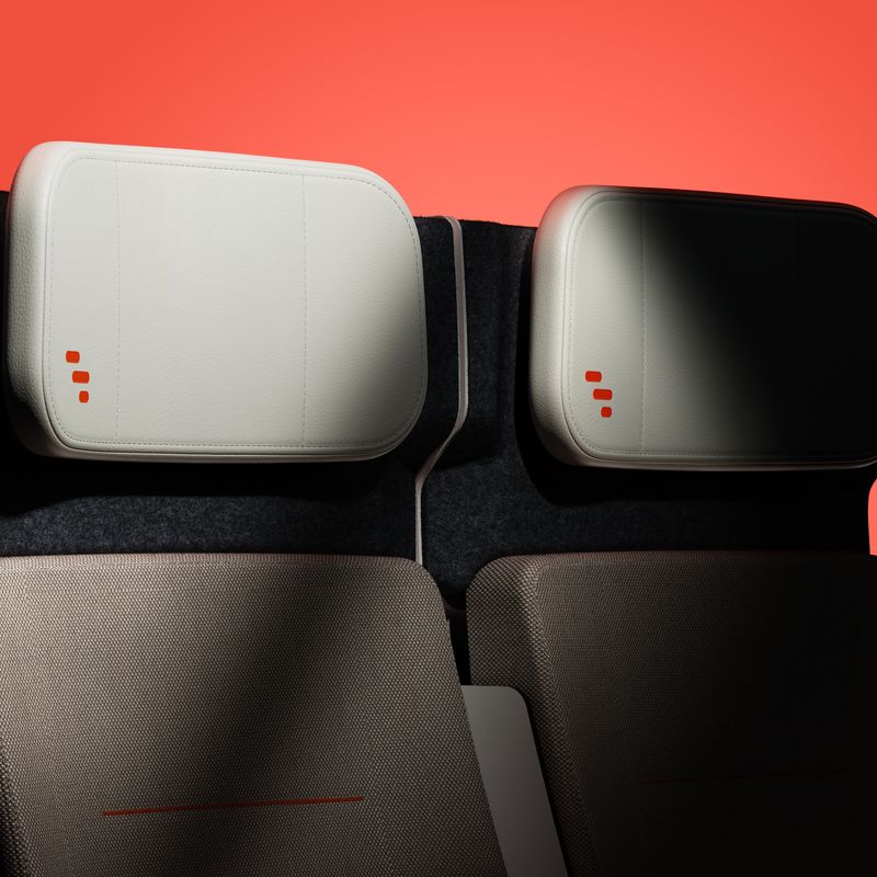 Mood shot of a pair of ALIZÉ rail seats, showing Expliseat branding.
