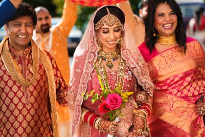 Bride Aashna Jain on the day of her traditional Indian wedding, at Langley Castle, Northumberland, UK  (Photo credit: Mick Merriott Photography)