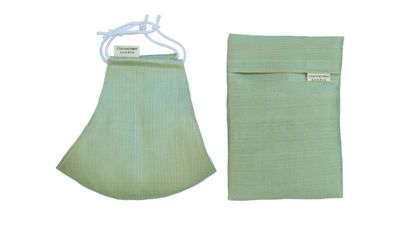 Sage green silk face mask with matching pouch, from Cocorose London