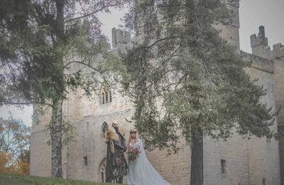 Couple in Game of Thrones bridal setting at Langley Castle Hotel