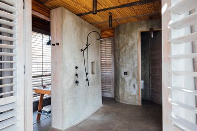 P_Asilia Lodges & Camps_Tanzania_Ruaha National Park 01_Jabali Ridge_Room Type_Guest Bedroom Bathroom.jpg