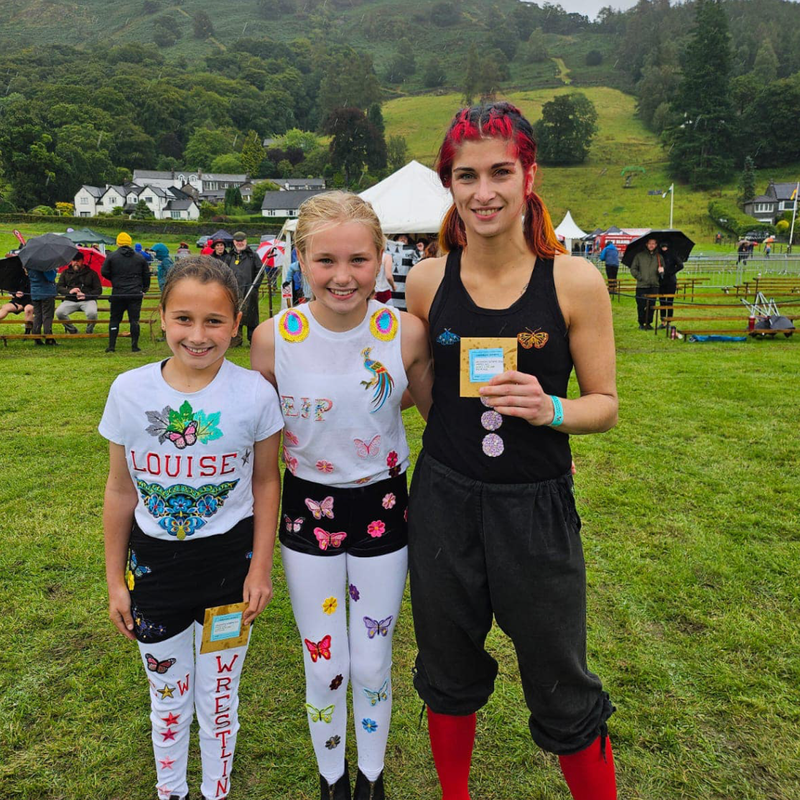 Ladies costume competition winners in the Grasmere Lakeland Sports and Show 2024 contest for Cumberland & Westmorland wrestlers. 