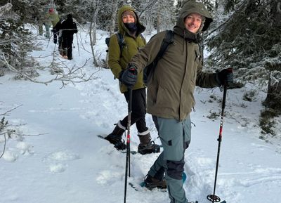 Reclaim Yourself Retreats in Finland snowshoe couple.jpg