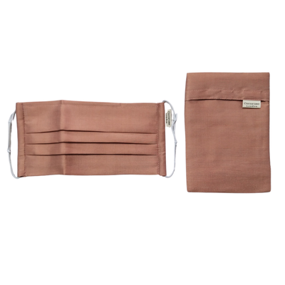 Blush-Bronze pleated silk face mask and matching silk pouch from Cocorose London.