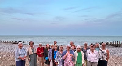 Guests on the Eastbourne trip head to the beach.jpg