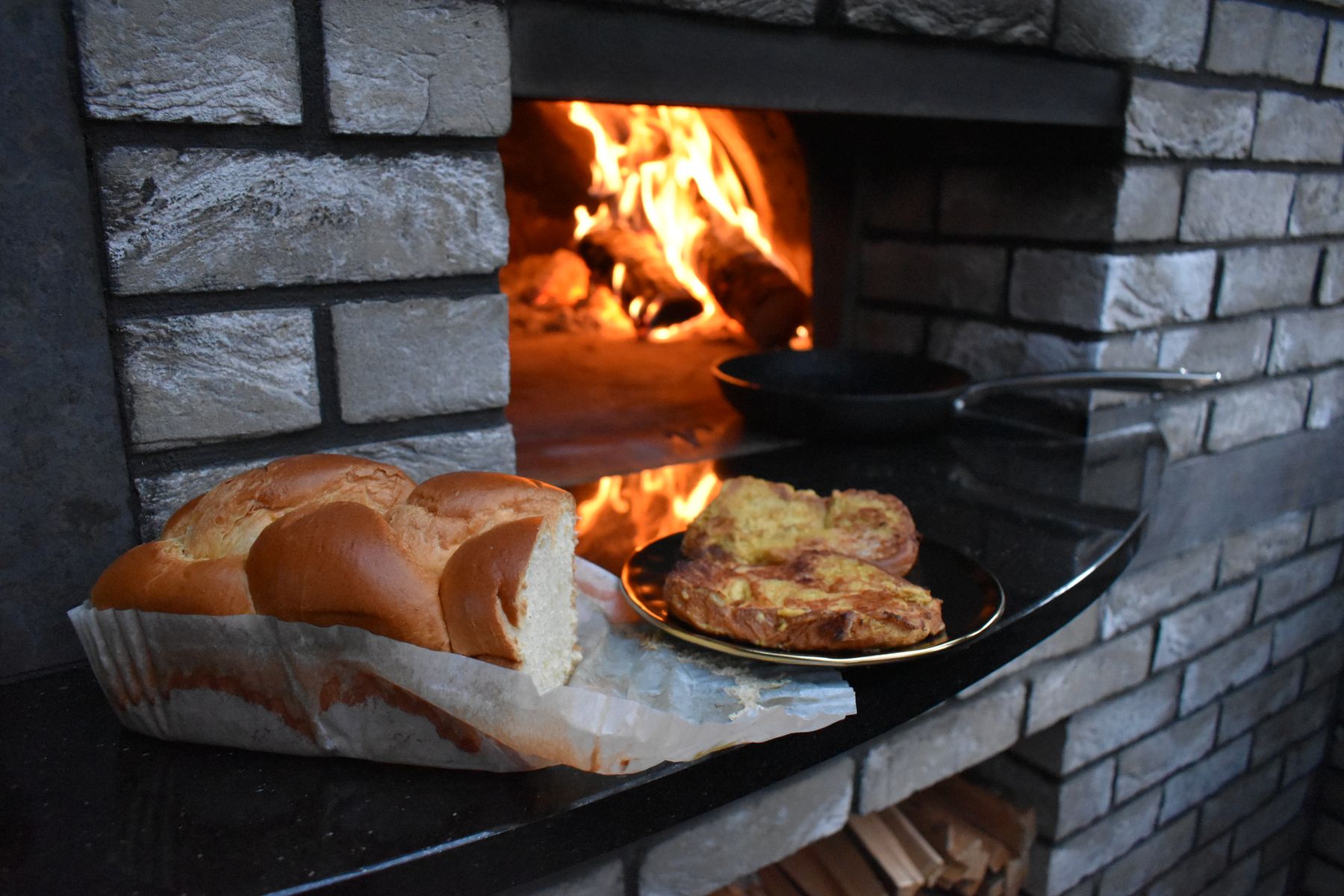 French toast being made in a wood-fired oven manufactured by Valoriani and supplied in the UK by Orchard Ovens