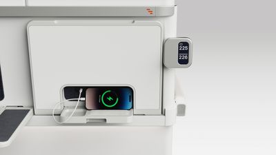 Rear view of ALIZÉ seat showing mobile phone charger outlet and phone storage space