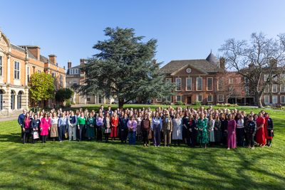 Attendees gather outside Somerville College, University of Oxford for Gardner Leader's International Women's Day event