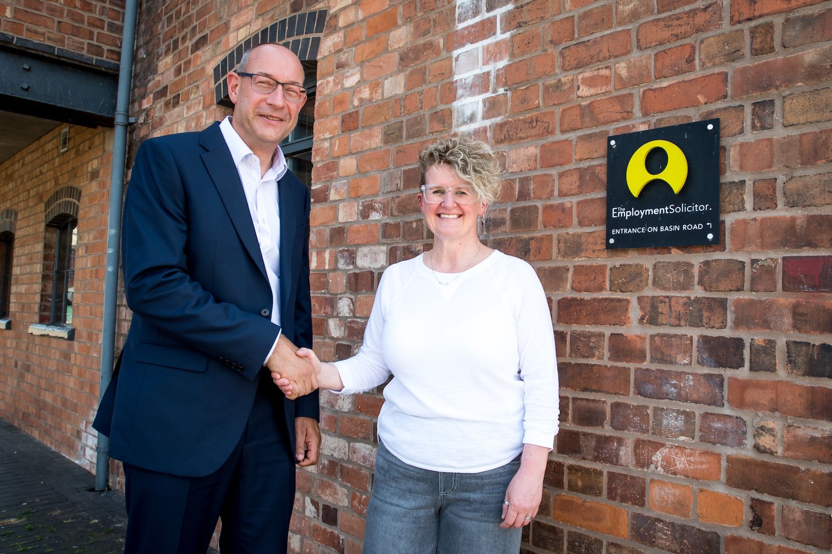 Chief executive of Adeptio Law Group and FBC Manby Bowdler, Neil Lloyd, with Helen Moore, managing director of The Specialist Law Group.jpg