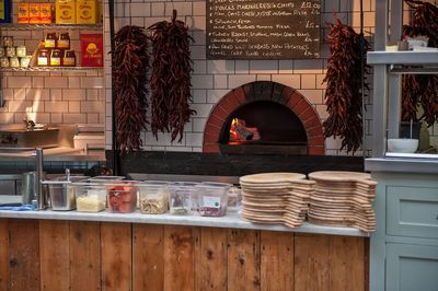 A Valoriani woodfired pizza oven in a commercial Italian pizzeria environment