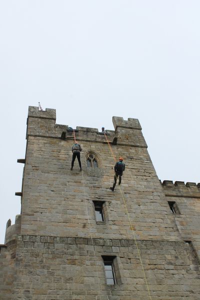 Plucky knights scale Langley Castle's walls, t