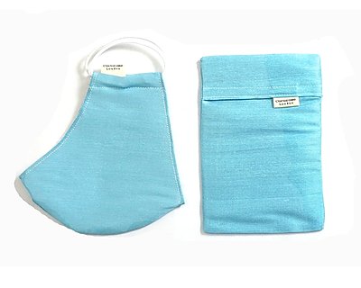 Sky Blue silk face mask and matching silk pouch from Cocorose London.