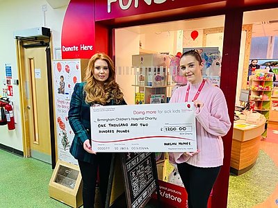 Horgan Homes Director Sophie Horgan presented a cheque for £1,200 to Philanthropy and Partnerships Executive Ellie Maybury at Birmingham Children’s Hospital.JPG