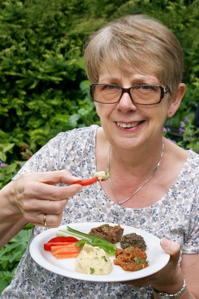 Woman eating crudites