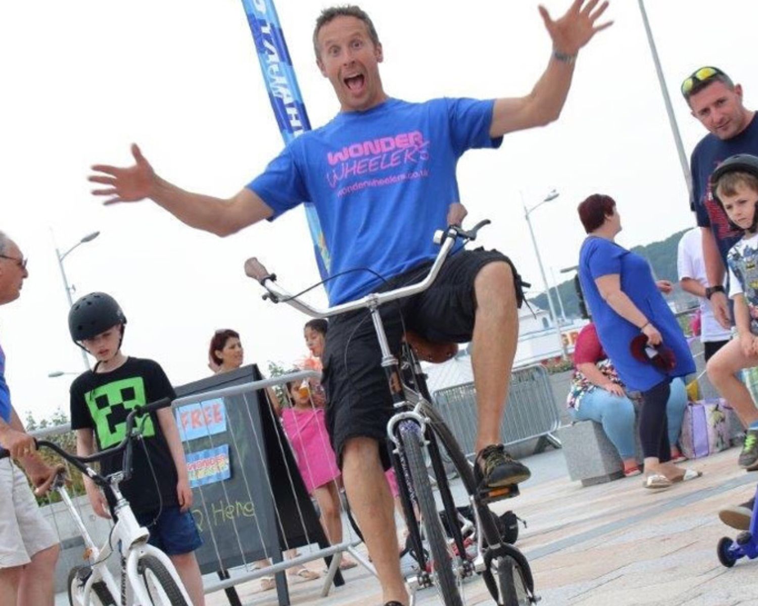 Man riding one of the fun and whacky bikes from Wonder Wheelers