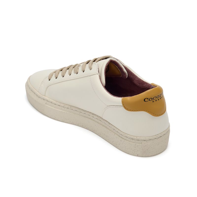 Plant-powered 'Kew' vegan trainer from Cocorose London, in white with Mostaza heel tab