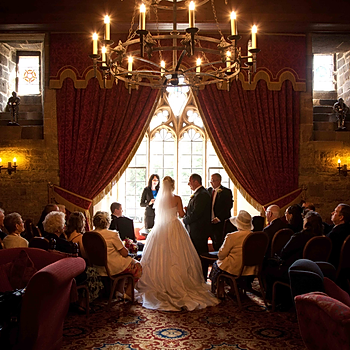 Intimate wedding in the drawing room of Langley Castle Hotel, Northumberland