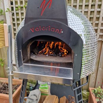 A Valoriani Fornino pizza oven with a mosaic finish - one of the bespoke options available.