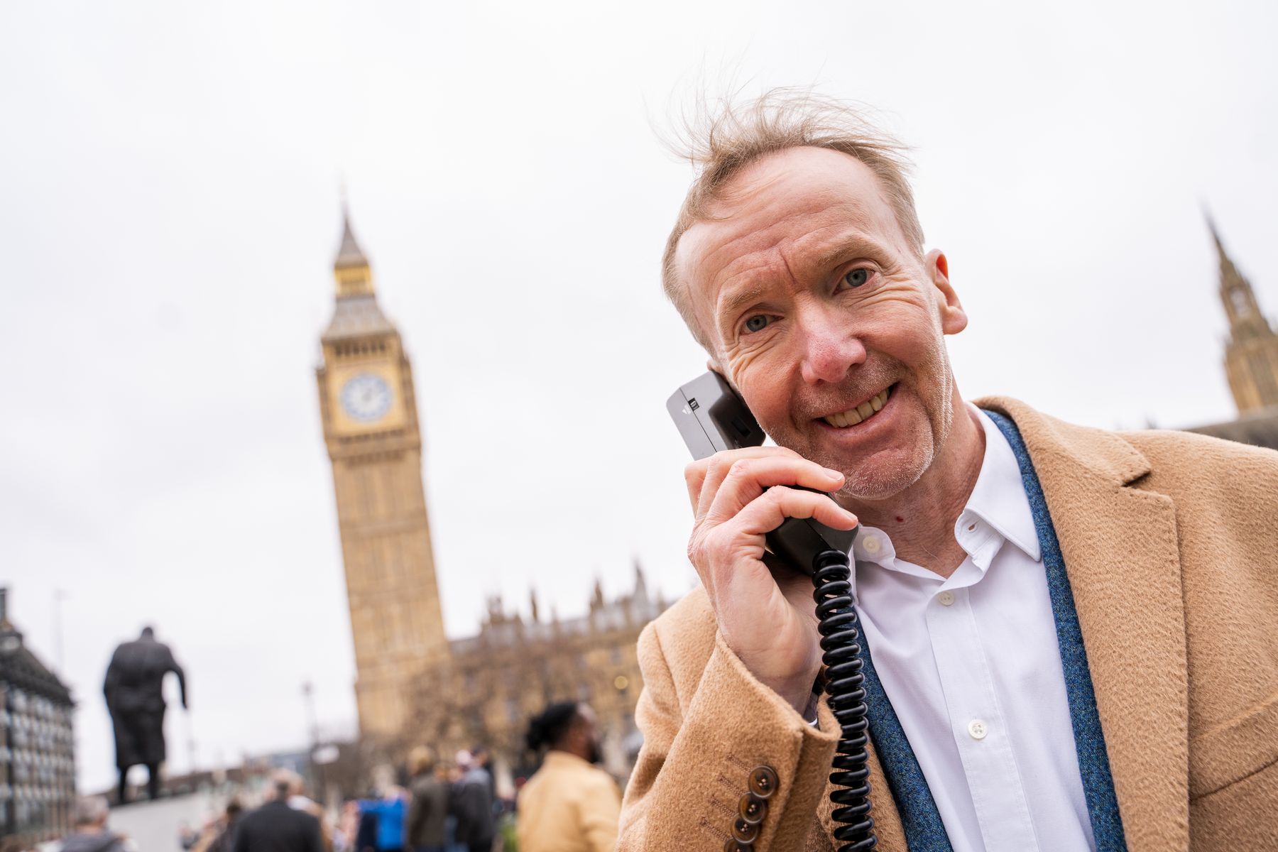 Michael Harrison, speaking on the Vodafone VT1 handset, recreating his iconic first UK mobile phone call 40 years on.jpg