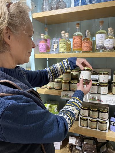 A shopper examines new Morocco Ale Chutney at Levens Hall and Gardens' shop.