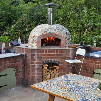 A new oven installation for summer 2025, created by Orchard Ovens, with a Valoriani oven at its centre.