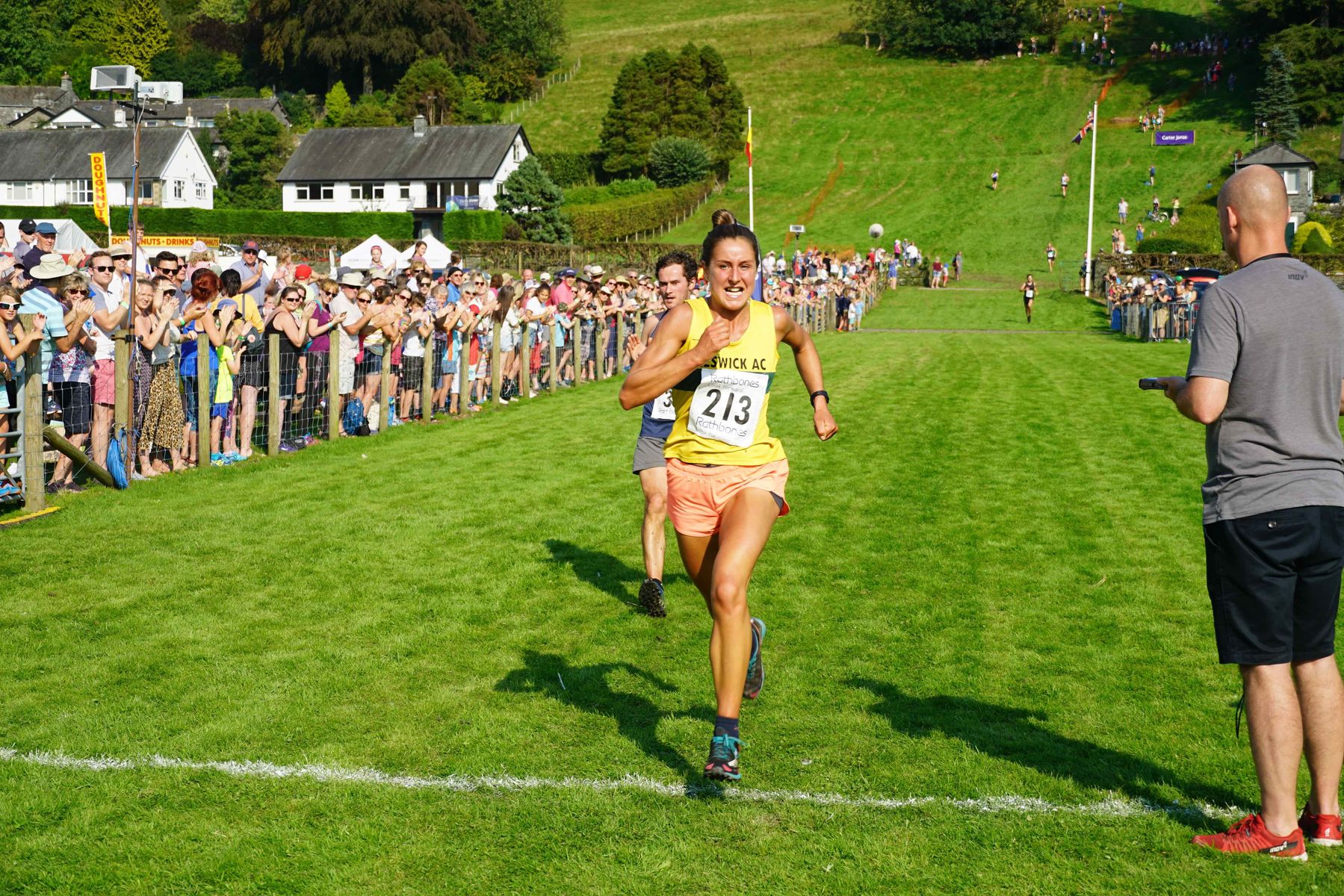 Fell runners cross the finishing line at Grasmere Sports and Lakeland Show