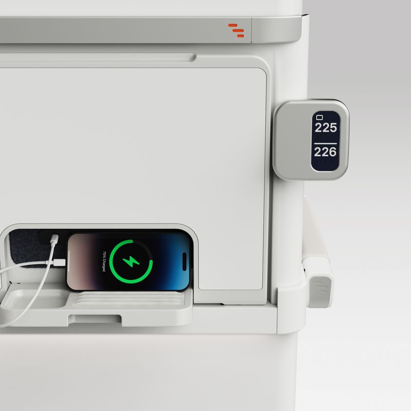 Rear view of ALIZÉ seat showing mobile phone charger outlet and phone storage space