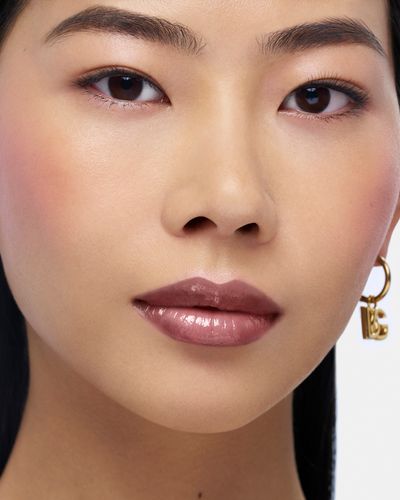 DG_MU25_COFFEE_OIL_LIP_PLUMPER_8056669926306_APPLIED_PRODUCT_JPG_4X5_300DPI.jpg