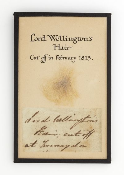 A lock of the Duke of Wellington's hair, within a display at Levens Hall.