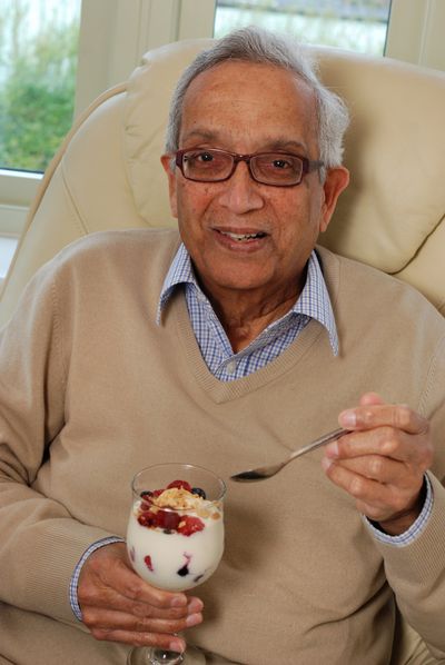 Gentleman eating a vegetarian dessert