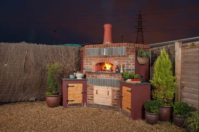 A Valoriani wood fired pizza. oven garden installation.