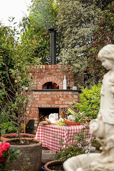 A Valoriani UK pizza oven garden installation