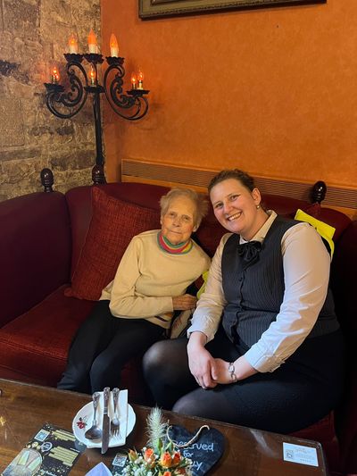Langley Castle super-fan, Molly, with Langley Castle member of staff, Eilidh.