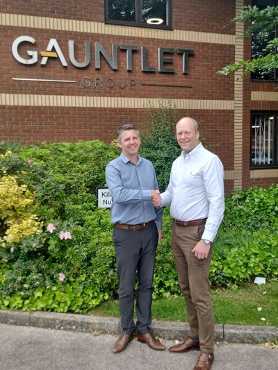 Paul Howley (the first broker from the Gauntlet Brokerage Builder programme) and Roger Gaunt, outside the Gauntlet Group HQ in Leeds.