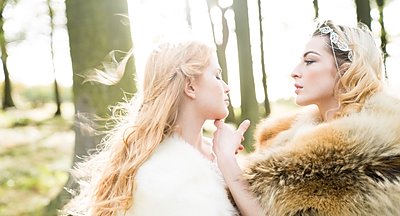 Female couple in the grounds at Langley Castle Hotel, Northumberland
