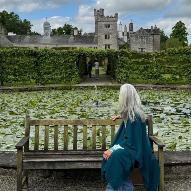 Francesca Anderson pictured in the Levens Hall Fountain Garden, with the Hall as the backdrop.