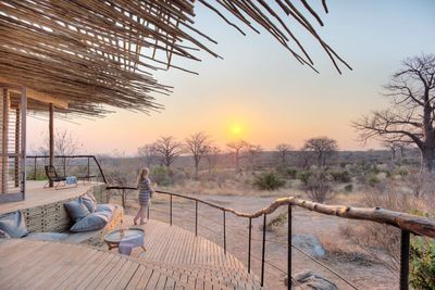 P_Asilia Lodges & Camps_Tanzania_Ruaha National Park 01_Jabali Ridge_Interiors_Exteriors_Lounging on Deck.jpg