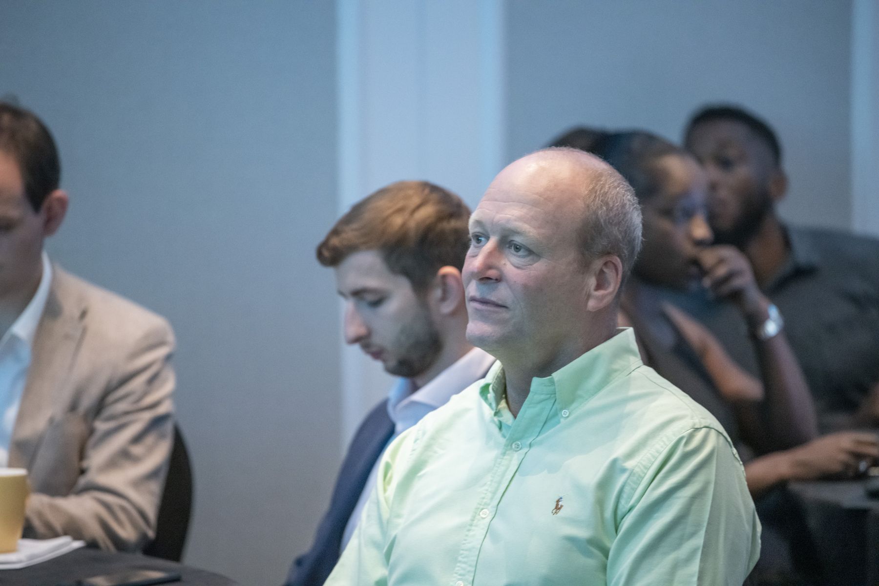 Roger Gaunt listening to insurer partner speakers at one of Gauntlet Group's three annual events for its Appointed Representative broker partners.