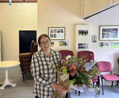Deborah Black, the retiring Sports and Field Manager of Grasmere Lakeland Sports and Show, with her bouquet of flowers.