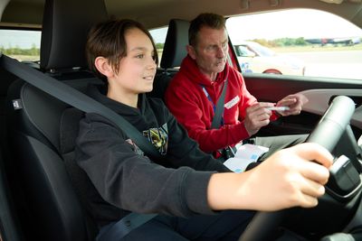 A youngster behind the wheel at their Young Driver lesson