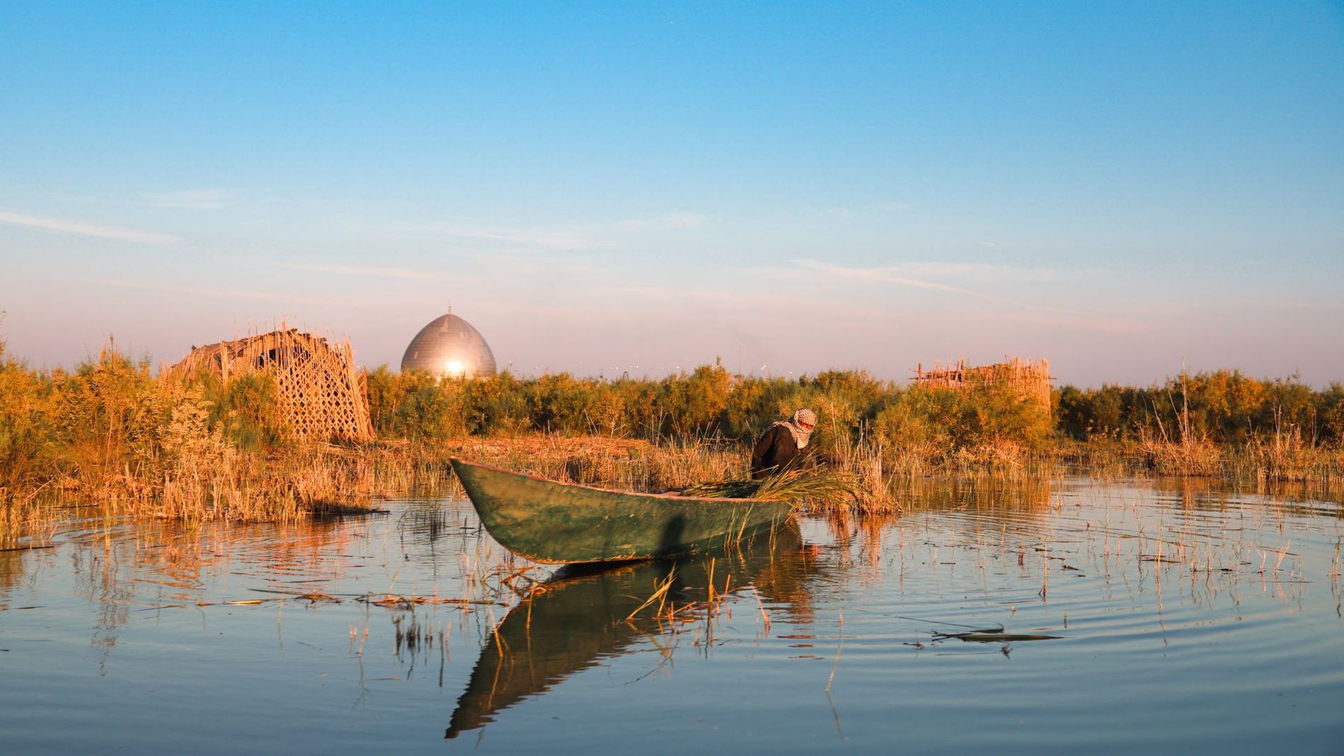 mesopotamian-marshes-boat-at-sunrise-iraq.jpg