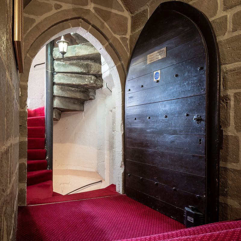 The medieval winding staircase at Langley Castle Hotel, Northumberland, UK