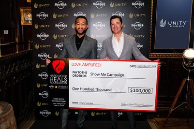 Keith Sheldon presents The Show Me Campaign check to John Legend on behalf of Hard Rock Heals Foundation - Credit Will Bailey .jpg